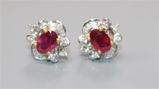 A modern pair of 18ct white gold, ruby and diamond cluster ear studs.